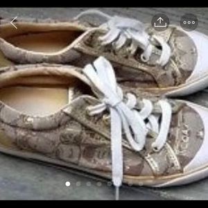 Coach. Gold sneakers